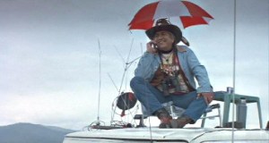 Lester Fallsapart (Leonard George) delivers the KREZ weather report in "Smoke Signals"/Movie still from ejumpcut.org